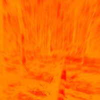 a blurry image of an orange fire